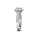 Opulent Sparkle: 18k Gold Emerald-Cut Diamond Ring with Glittering Accents