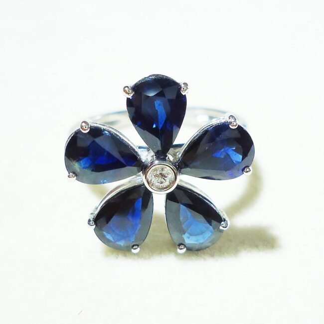 Blue Sapphire Diamonds Flower Ring in 18K White Gold