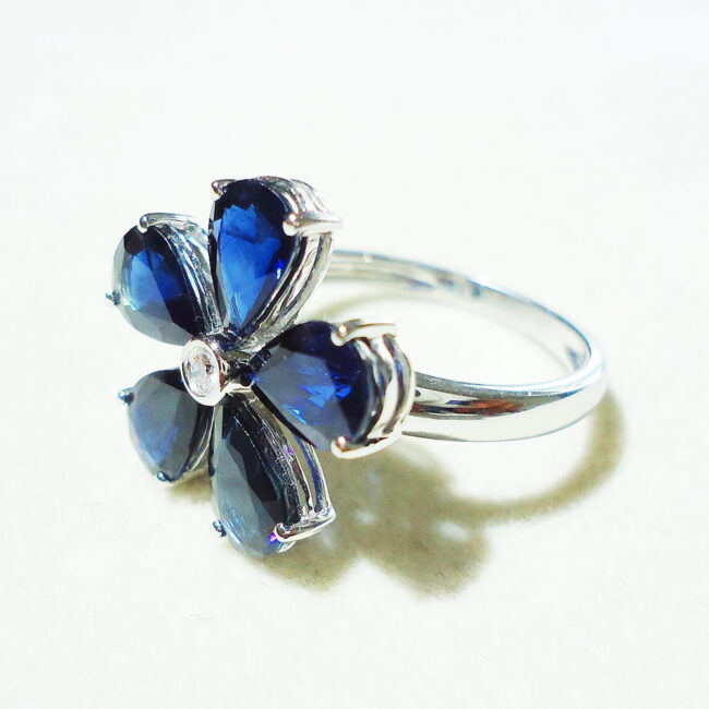 Blue Sapphire Diamonds Flower Ring in 18K White Gold