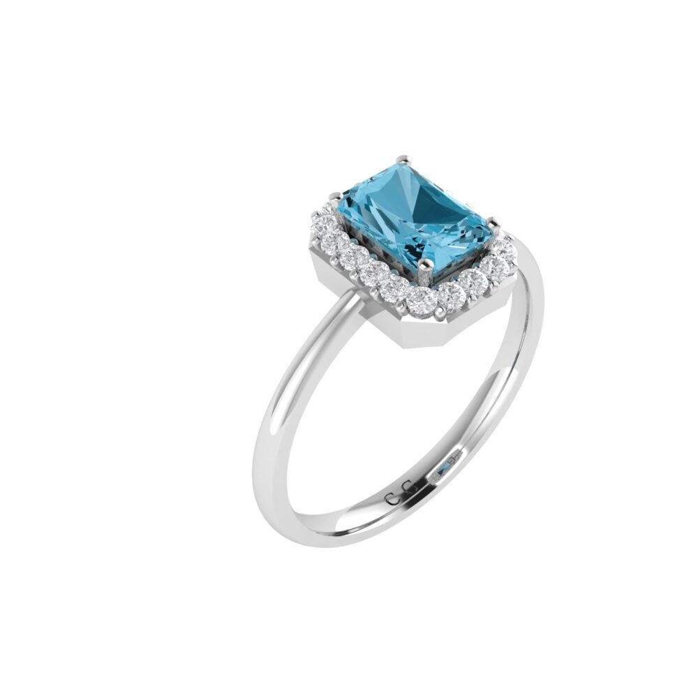 Diana Emerald  Cut Blue Topaz and Glinting Diamond Ring in 18K Gold (0.25ct)