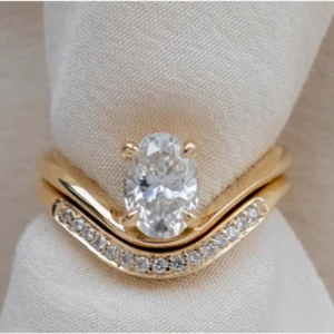 18K yellow gold oval lab grown diamond bridal set 1.40 TCW IGI certified Dubai UAE engagement wedding ring set
