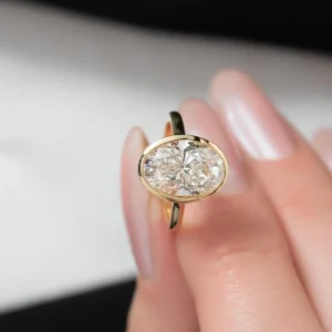 lab grown diamond ring Dubai oval bezel 18K gold IGI certified