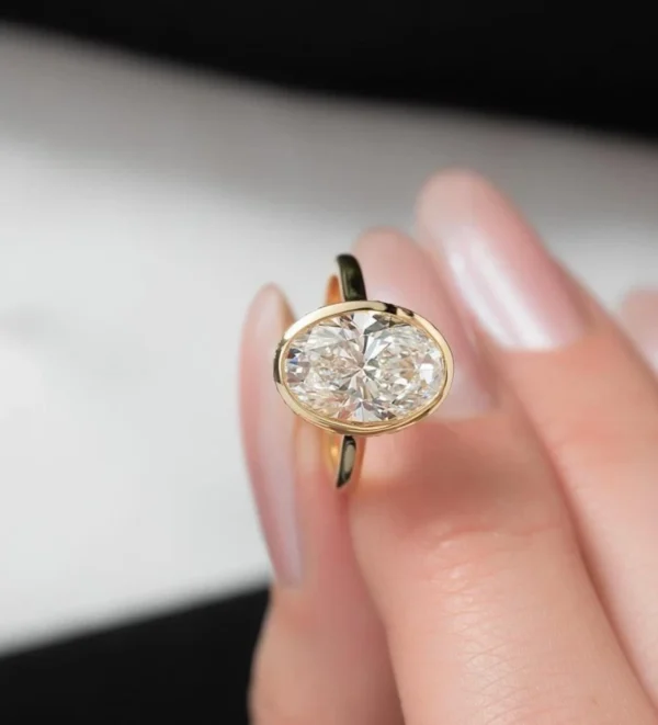 lab grown diamond ring Dubai oval bezel 18K gold IGI certified