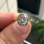 1.60 CT oval cut lab grown diamond engagement ring 14K yellow gold Dubai IGI certified D VVS2 handcrafted UAE