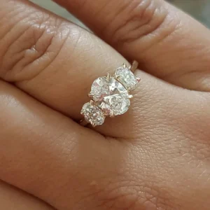Oval Lab Grown Diamond Trilogy Ring in 14K Yellow Gold – IGI Certified | Dubai Luxury Jewelry