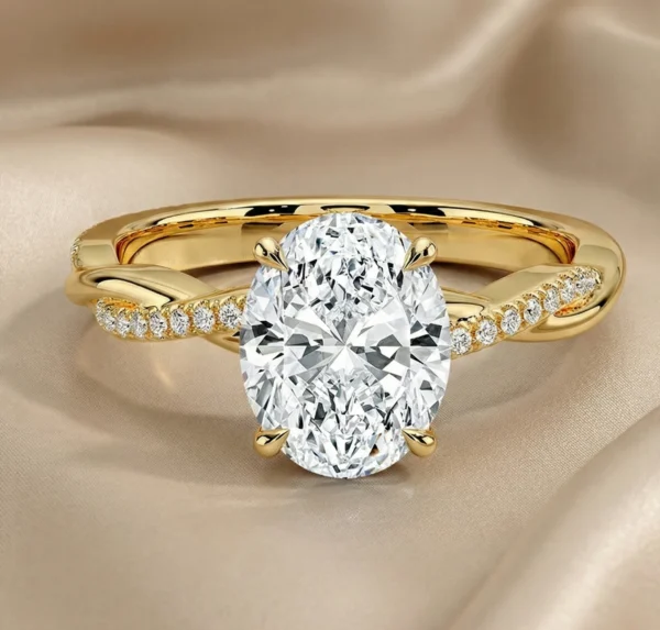 2.20 Ct Oval Lab-Created Diamond Engagement Ring with Twisted Pavé Band in 14K Yellow Gold | IGI Certified