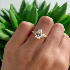 2.00 CTW Pear Lab-Grown Diamond Three-Stone Engagement Ring in 14K Yellow Gold | IGI Certified E VVS2