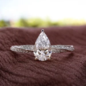 Pear lab grown diamond engagement ring 14K white gold IGI certified Dubai luxury jewelry 1.70 CTW
