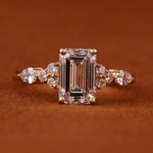 5 CT emerald cut IGI certified lab-grown diamond engagement ring in 14K yellow gold handcrafted in Dubai